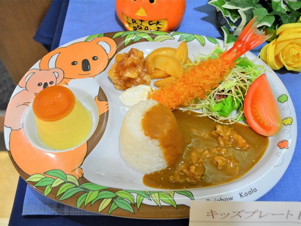Kids menu in a cafe, consisting of smaller portions of “adults” menu includes salad, side dish and a small dessert