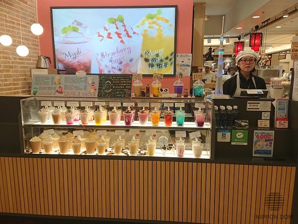 Food display with cute cow figurines emphasizing natural ingredients and farm-to-table style