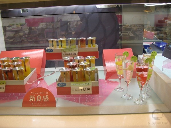 Fruit drink replicas in elegant clear glasses for creative beverage presentation