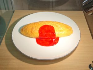 A copy of the very first food replica ever created in Japan — a symbol of craftsmanship that began in 1932 and grew into an art form admired worldwide.