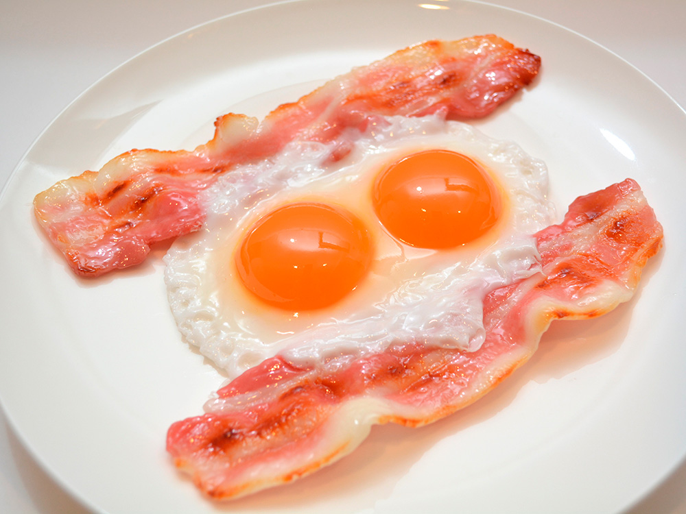 realistic silicone food replicas of fried eggs and bacon made in Japan