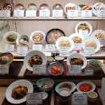 Restaurant window display with warm 2700K lighting, Japanese expert standard