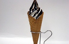Chocolate sauce vanilla waffle cone