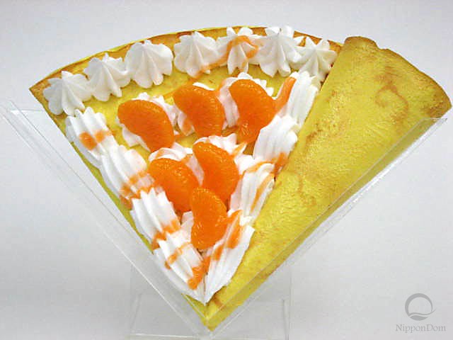 Fake pancake with mandarin and whipped cream