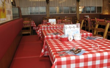 Table setting in the restaurant Rakeru resembles the one in a farmhouse