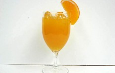 Orange juice decorated with orange (glass)