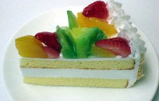 A replica of fruit cake (105×55 mm)