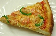A slice of shrimp pizza